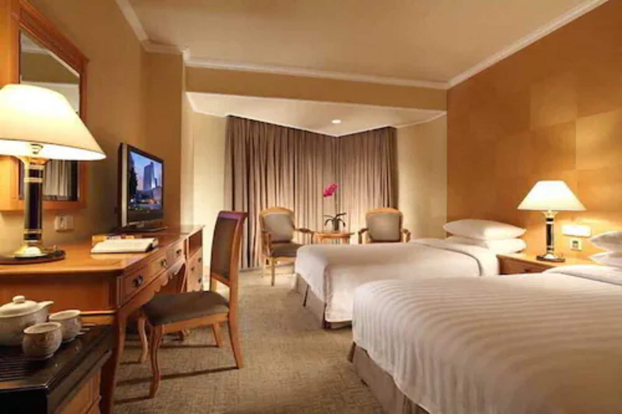 Beijing New Century Hotel Habitación foto
